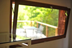 A charming little cottage nestled among the trees - Image 3