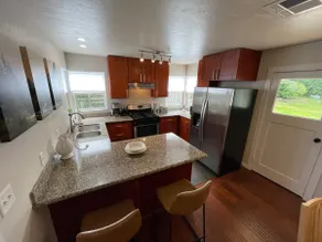 Spruce Cottage Bright 3 Bedroom 2 Bath near Henderson Center. Master suite. - Image 2