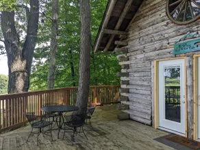 Rustic Retreat with Hot Tub-Cozy Log Cabin Getaway - Image 4