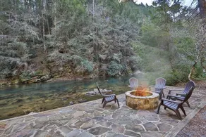 Riverfront cabin with WiFi, 2 fireplaces, game room, pool table and hot tub. - Image 2