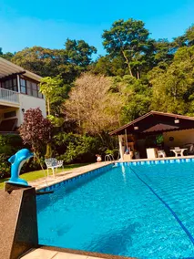 House in the mountains in a condominium with a waterfall - Image 3