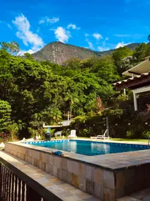 House in the mountains in a condominium with a waterfall - Image 4