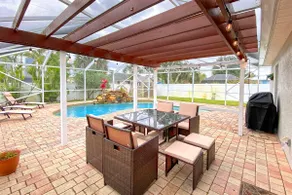 Newly Furnished, Solar Heated pool, Game room, 10 mins from Beach - Image 4