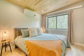 Modern Retreat with Game Room and Lake Views - Image 4