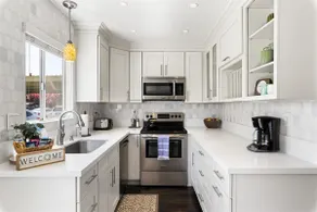 Walkable location, vibrant design, heated pool! - Image 4