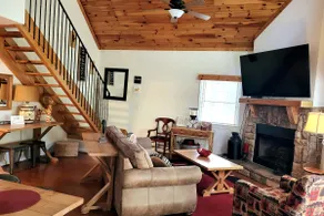 Relax in comfort at the Alpine Cottage 2 which is centrally located in Helen. - Image 2