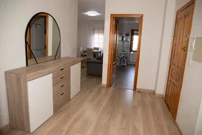 A bright apartment in a residential development with a swimming pool - Image 2