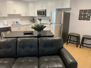 New 2 bed walk-out suite in executive home w/ pool - Image 4