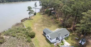 WATERFRONT!! **HOT TUB**  3 bedroom Oasis on 2+ acres - Sleeps 8 - Image 2