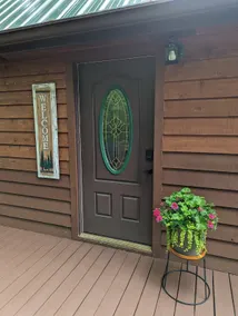 Cozy cabin with wrap around porch and only minutes to town! - Image 3