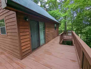 Cozy cabin with wrap around porch and only minutes to town! - Image 4