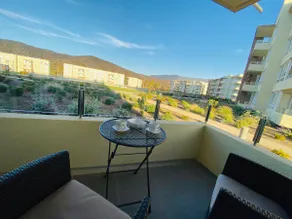 Cozy, in front of the condominium pool. - Image 3