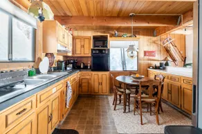Charming Cabin Near Outdoor Adventures - Image 3