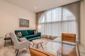 Prime City Location 1BR Apartment near Grand Opera - Image 3