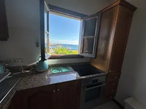 Sea View Coastal Apartment with Pool - Image 3