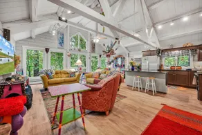 Whimsical cabin — 4 acres with hot tub, fire pit, spacious screened porch & pond - Image 4