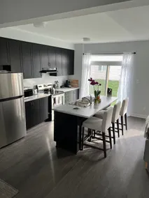 Spacious 3-Bedroom Townhome w/ Free Parking - Image 3