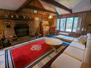 Riverfront Cozy Cabin with a Sauna and Fireplace - Image 2