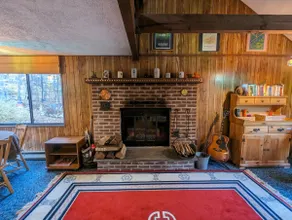Riverfront Cozy Cabin with a Sauna and Fireplace - Image 3