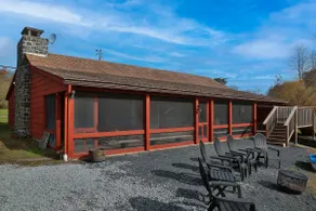 Serene cabin on 6 acre pond in rural Upper Bucks - Image 4