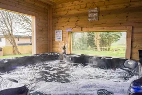 Unwind in Nature's Embrace with Sauna and Hot Tub - Image 2