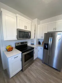 Cute remodeled 2 bedroom with office, long drive way, and 75” TV. - Image 4