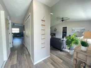 Stunning home with screened patio & fenced yard - Image 2