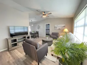 Stunning home with screened patio & fenced yard - Image 3