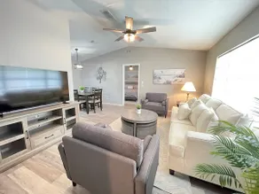 Stunning home with screened patio & fenced yard - Image 5