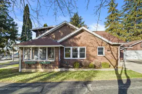 Red Brick Home Near Lake - Image 3