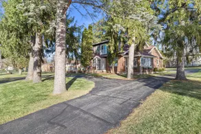 Red Brick Home Near Lake - Image 2