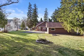 Red Brick Home Near Lake - Image 5