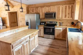 Cozy log cabin with Lakefront and Private Dock - Image 4