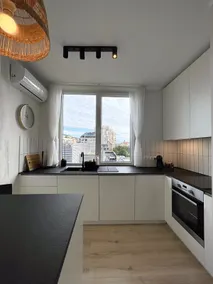Mid-Century Modern Apartment with Private Parking - Image 3