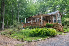 Seclusion-Escape to this Cozy Getaway in the Woods - Image 2
