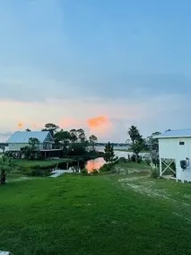 Updated house on lagoon! Quick walk to the beach and beautiful water view! - Image 3