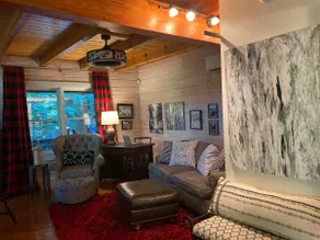 Hacker Habitat Charming Cabin Nestled in South Mts - Image 5