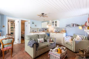 One bedroom, indoor fireplace. Right beside beach. - Image 2