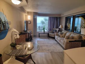 Beachfront Escape with Balcony, Views, and Comfort - Image 3