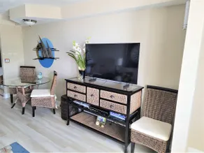 Beachfront Escape with Balcony, Views, and Comfort - Image 4