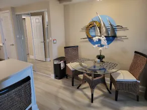 Beachfront Escape with Balcony, Views, and Comfort - Image 5