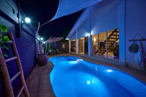 Centrally located 4 bedroom home with cozy pool and patio - Image 2