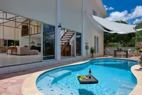 Centrally located 4 bedroom home with cozy pool and patio - Image 4