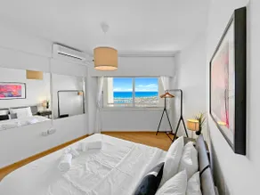 1BR Seafront Apt with community pool - Image 4
