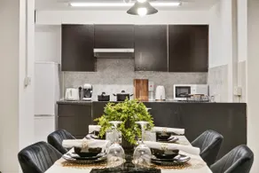 Stylish 2BR Luxury Retreat with 65" Smart TV - Image 3