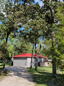 Adorable Red Roof Cottage nestled in treed acreage - Image 3