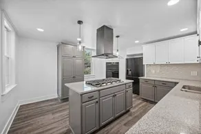 Completely Renovated 4-Bedroom with Parking - Image 4