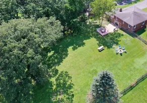 HUGE 1.7 Acre lot w/fenced in back yard! - Image 3
