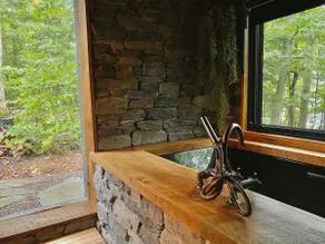 Escape to a renovated 130 y.o. cabin on 850 acres. - Image 4