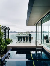 Luxury waterfront home with pool and beach access - Image 2
